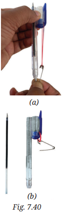 Pen refill and rubber band setup